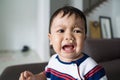 Fussy baby with snots dripping on his face stock photo