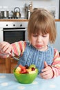 Fussy Child Rejecting Delicious Fruit Salad Pudding Royalty Free Stock Photo