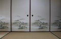 Fusuma sliding door dividers and Tatami mats in Washitsu Royalty Free Stock Photo