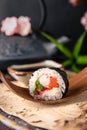 Futomaki with salmon, royal prawn, avocado, chuka, tobacca and cream cheese Philadelphia Sushi menu. Royalty Free Stock Photo