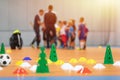 Futsal Soccer Training Court. Kids in a Group With Coaches in Blurred Background