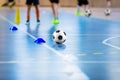 Futsal soccer training field. Young sports players with balls on training Royalty Free Stock Photo