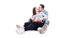 Future father kissing his pregnant wife on cheek Royalty Free Stock Photo