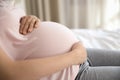 Young pregnant woman in ninth month embrace big belly Royalty Free Stock Photo