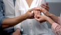 Future mother-in-law holding hand of daughter with engagement ring, marriage Royalty Free Stock Photo