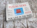 Future Newspaper Business Concept: You Live In The Past, 3d illustration