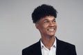 The future is not as far off as you think. Studio shot of a young businessman looking away thoughtfully against a grey Royalty Free Stock Photo