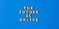 The future is online text with mobile phone. Technologies on workplace. The future is online lettering. Online education, work Royalty Free Stock Photo