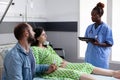 Future parents discussing with nurse Royalty Free Stock Photo