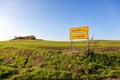 Future and past life road signs in a green field Royalty Free Stock Photo