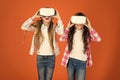 Future is present. Cyber space and virtual gaming. Virtual reality technology. Discover virtual reality. Kids girls play Royalty Free Stock Photo