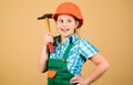 Future profession. Child care development. Builder engineer architect. Kid worker in hard hat. Tools to improve yourself