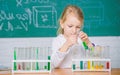 Future scientist. Explore and investigate. School lesson. Interesting approach to learn. Girl cute school pupil play Royalty Free Stock Photo