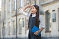 Future smiling here. Happy child with book look ahead. Educational perspective. School education. Motivation for study Royalty Free Stock Photo