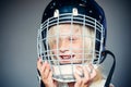 Future sport star. Sport upbringing and career. Girl cute child wear hockey helmet close up. Safety and protection