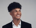 The future is for those with vision. Studio shot of a young businessman looking away thoughtfully against a grey Royalty Free Stock Photo