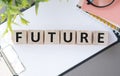 Future word written on wood block. Future text on cement table for your desing, concept Royalty Free Stock Photo