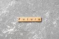 Future word written on wood block. Future text on cement table for your desing, concept Royalty Free Stock Photo