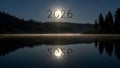 Future Year 2026 Reflection in Calm Lake at Night with Moonlight and Forest Silhouette Royalty Free Stock Photo