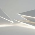 Futuristic abstract design featuring smooth, white, triangular forms with glowing edges.