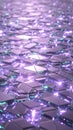 Futuristic abstract geometric surface with hexagonal and triangular facets in metallic purple and teal glowing with internal light Royalty Free Stock Photo
