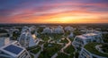 Futuristic architectural complex at sunset, featuring white, angular buildings with Royalty Free Stock Photo