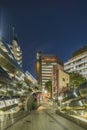 TOKYO, JAPAN - August 21 2018: Futuristic architecture with mirroring and transparent blue plastic panels swiveling in Shibuya Royalty Free Stock Photo