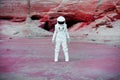 Futuristic astronaut on another planet, image with