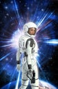 Futuristic astronaut girl in space suit and planet Royalty Free Stock Photo