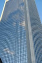 futuristic blue mirror square tower, multi-storey skyscraper in district, office commercial areas in Frankfurt, Germany, glass Royalty Free Stock Photo