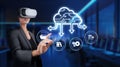 Futuristic Businesswoman Using Virtual Reality to Access Cloud Computing Services and Manage Online Data in a Modern Royalty Free Stock Photo