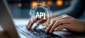 Futuristic coding interface with hands on keyboard, highlighting innovative API technology Royalty Free Stock Photo