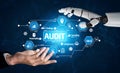 Futuristic Concept of Audit with Human Hand and Robotic Arm Interacting Over Digital Interface Representing Inspection Royalty Free Stock Photo