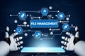 Futuristic Concept of File Management System with Robotic Hands Interacting with Data Storage Icons and Digital Royalty Free Stock Photo