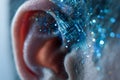 Futuristic concept of human ear enhanced with digital circuit patterns symbolizing advanced technology integration and artificial Royalty Free Stock Photo