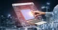 Futuristic Concept of Programming and Coding on a Transparent Laptop Screen in an Urban Night Scene with City Lights and Royalty Free Stock Photo