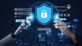 Futuristic Cyber Security Concept with Robotic Hand and Human Touching Lock Icon on Digital Interface for Data Royalty Free Stock Photo