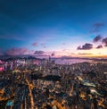 Futuristic cyberpunk view of the famous metropolis, night aerial view of Kowloong Hong Kong