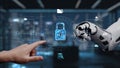 Futuristic Cybersecurity Concept with Human Hand and Robotic Arm Interacting with Digital Lock Interface in High-Tech Royalty Free Stock Photo