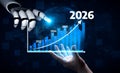 Futuristic Data Analysis with Robotic Hand Interacting with Growth Chart Representing Years 2023 to 2026 in a Technology Royalty Free Stock Photo