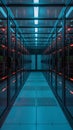 Futuristic Data Center Corridor With Blue Lighting and Symmetrical Server Racks Royalty Free Stock Photo