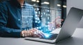 Futuristic data visualization overlaying a person working on a laptop Royalty Free Stock Photo