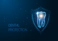 Futuristic dental protection concept with glowing low polygonal molar tooth and protective shield