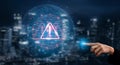 Digital alert symbol with warning triangle on futuristic interface, representing cybersecurity threats and data Royalty Free Stock Photo