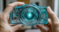 A futuristic digital camera held with two human hands Royalty Free Stock Photo