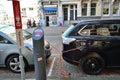 Futuristic electric concept car charging amsterdam