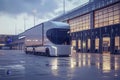 An advanced electric truck stands ready at a loading dock at dusk, highlighting modern Royalty Free Stock Photo