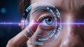 Futuristic eye scan technology interface with human finger and blue eye close up Royalty Free Stock Photo