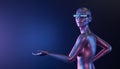 Futuristic girl with luminous glasses pointing to an empty space Royalty Free Stock Photo