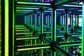 Futuristic green neon light cube art installation. Technology cyber cube Royalty Free Stock Photo